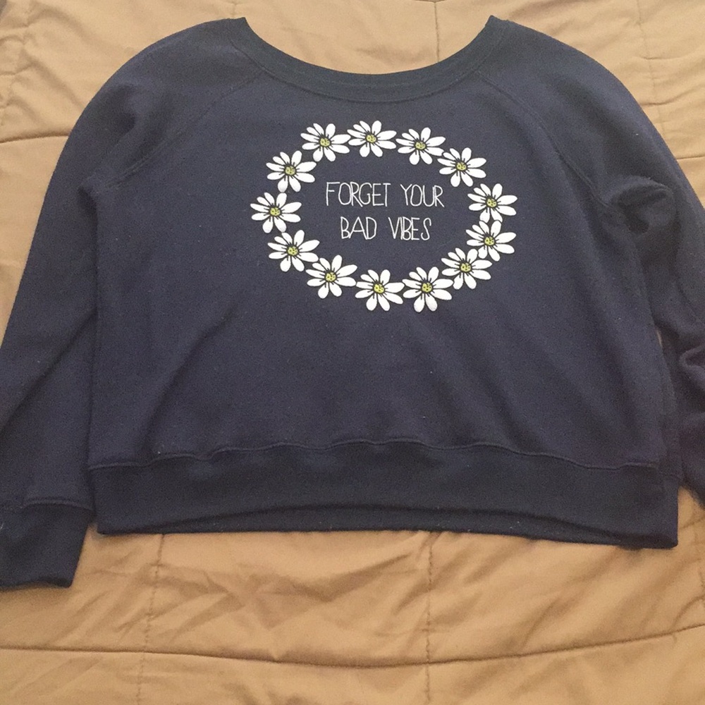 Forget your bad vibes and buy this sweater